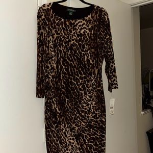This gorgeous dress is lined brand new, perfect condition with 3/4 sleeves.
